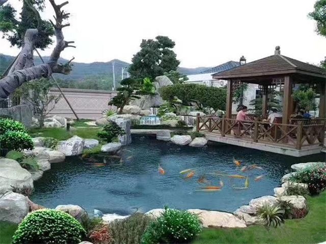 隆安庭院鱼池假山设计